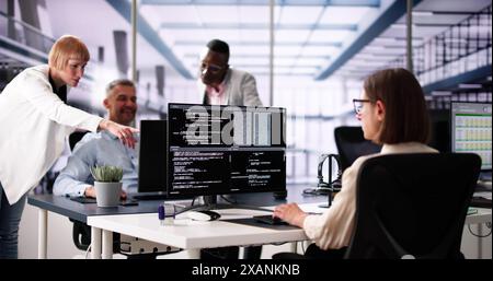 Software Engineer Developer Using Desktop Computer. Coding On PC Stock Photo