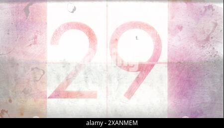 Large number 29 is displayed on textured background with pink and white tones Stock Photo