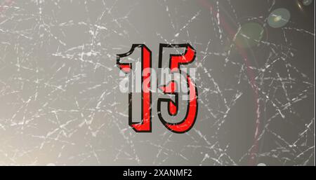 Number 15 is displayed in bold red and black on textured background Stock Photo