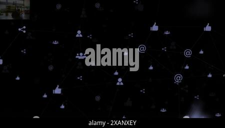 Image of technology icons floating on black background, copy space Stock Photo