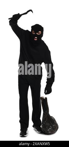 Angry thief in balaclava raising hand with crowbar on white background Stock Photo