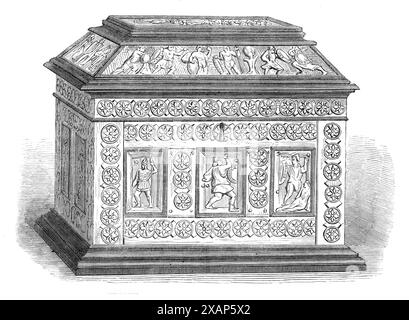 Art Collections in the South Kensington Museum: Byzantine casket of bonework, set in ebony, 1869. One of '...a variety of specimens of antique or foreign art-manufactures in the Loan Collection and other departments of the South Kensington Museum...One of these articles is a four-sided casket, about 10 in. in length and height, and 7 in. wide, composed of bone panels carved in low relief, with figures of warriors surrounded by a rosette border. The top consists of an ivory panel sculptured in high relief, with a representation of horsemen and men on foot engaged in combat. This top panel is a Stock Photo