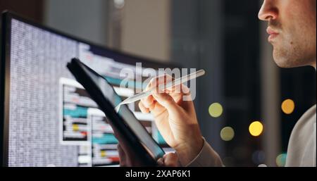 Hands, working and tablet in office at night for programming, problem solving or process with bokeh. Male person, ebook and stylus for plan with Stock Photo