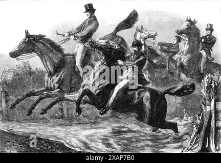 The Horse Show at the Agricultural Hall: the fence and water jumping, 1869. 'The most amusing performance was that of the water jump. It was a shallow pool of muddy water, like a piece of a wide ditch, with a low slanting hurdle on the taking-off side of the leap. To the right and to the left hand of this obstacle the line of barrier was diversified by other fences, consisting of hurdles stuffed and topped with furze; in some places there was a double fence of this kind. They were arranged by the directors and executive officials of the Horse Show, with the aid of Mr. Anstruther Thomson, Capta Stock Photo