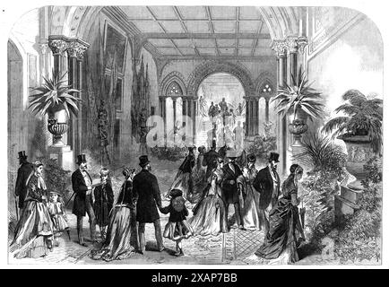 The Grand Staircase at the Leeds Exhibition of Arts, 1868. Visitors at a cultural event in Yorkshire. From "Illustrated London News", 1868. Stock Photo