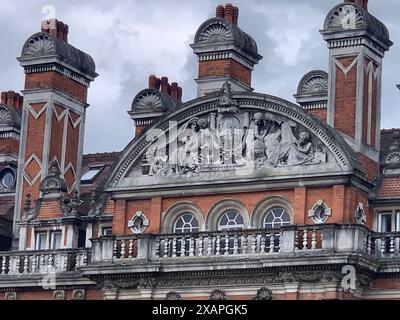 Royal Holloway in Egham, Surrey. 'Today's Royal Holloway is formed from two colleges, founded by two social pioneers, Elizabeth Jesser Reid and Thomas Holloway. They were among the first places in Britain where women could access higher education. Bedford College, in London, opened its doors in 1849, and Royal Holloway College's stunning Founder's Building was unveiled by Queen Victoria in 1886 – it’s still the focal point of the campus. In 1900, the colleges became part of the University of London and in 1985 they merged to form what is now known as Royal Holloway' Stock Photo