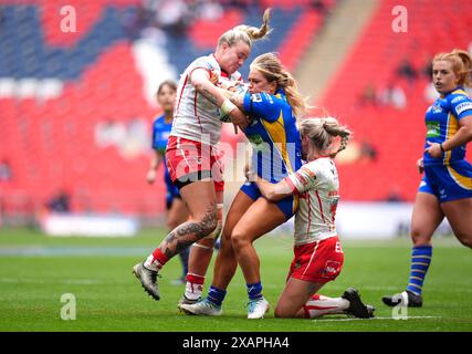 St Helens' Naomi Williams (centre) Is Tackled By Leeds Rhinos' Keara 