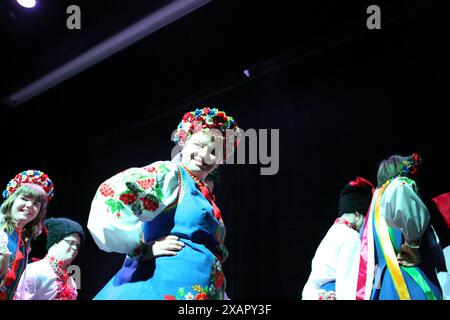 Odessa, Ukraine. 07th June, 2024. Actress with mental disabilities dressed in national Ukrainian costumes of the Theater of Tolerance perform the play 'A Look at the History of Ukraine' at the Jewish Cultural Center 'Beit Grand' The Theater of Tolerance, managed by the Special Youth of Ukraine Foundation with the support of the League of Jewish Volunteers, organizes the play “A Look at the History of Ukraine,” the purpose of which is to help people with special needs adapt to modern society. Credit: SOPA Images Limited/Alamy Live News Stock Photo