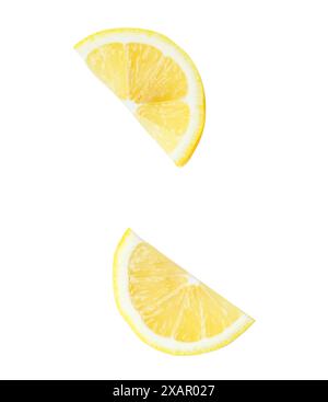 Top view set of fresh yellow lemon slices or quarters scattering is isolated on white background with clipping path. Stock Photo
