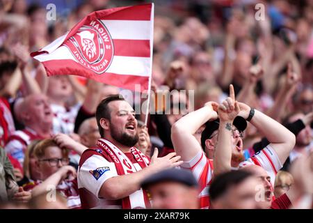 Wigan Warriors fans cheer during the Betfred Challenge Cup final at Wembley Stadium, London. Picture date: Saturday June 8, 2024. Stock Photo