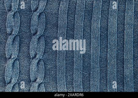 Close-up of blue knitted fabric with twists Stock Photo