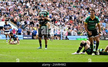 Twickenham, United Kingdom. 08th June, 2024. Gallagher Premiership Rugby final. Northampton Saints V Bath Rugby. Twickenham Stadium. Twickenham . The Northampton players celebrate at the end of the game as the Bath players are on their knees during the Gallagher Premiership rugby final between Northampton Saints and Bath Rugby. Credit: Sport In Pictures/Alamy Live News Stock Photo