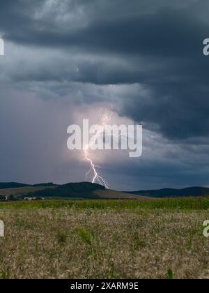 Lightning bolt strikes hitting a mountain in a storm near Phoenix ...