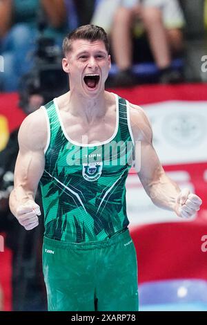 08 June 2024, Hesse, Frankfurt/Main: Gymnastics: German Championships, Decisions, All-around, Men, Süwag Energie Arena. Lukas Dauser (TSV Unterhaching) cheers after a routine. Photo: Uwe Anspach/dpa Stock Photo