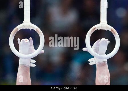 08 June 2024, Hesse, Frankfurt/Main: Gymnastics: German Championships, decisions, all-around, men, Süwag Energie Arena. Andreas Toba (TK Hannover) performs on the rings. Photo: Uwe Anspach/dpa Stock Photo