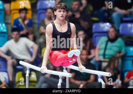 08 June 2024, Hesse, Frankfurt/Main: Gymnastics: German Championships, decisions, all-around, men, Süwag Energie Arena. Timo Eder (MTV Ludwigsburg) performs on parallel bars. Photo: Uwe Anspach/dpa Stock Photo