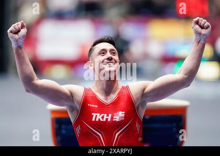 08 June 2024, Hesse, Frankfurt/Main: Gymnastics: German Championships, Decisions, All-around, Men, Süwag Energie Arena. Andreas Toba (TK Hannover) cheers after a routine. Photo: Uwe Anspach/dpa Stock Photo