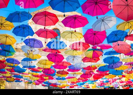 Strung up umbrellas in Catania, Italy. Stock Photo