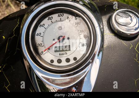 Speedometer on old black vintage motorcycle closeup Stock Photo