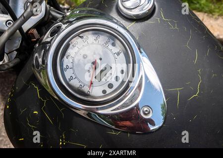 Speedometer on old black vintage motorcycle closeup Stock Photo