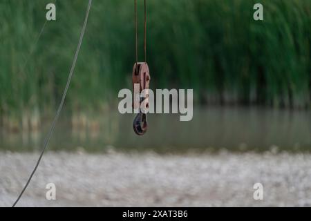 A primitive winch system. Hooked load hoist Stock Photo