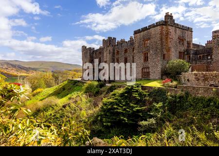 Muncaster Castle, a Medieval castle, home of the Frost Pennington family, viewed from the gardens, Ravenglass, Cumbria, Lake District, England, UK. Stock Photo