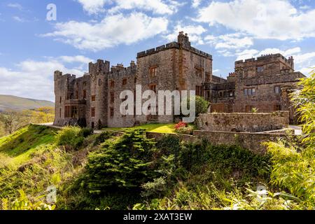 Muncaster Castle, a Medieval castle, home of the Frost Pennington family, viewed from the gardens, Ravenglass, Cumbria, Lake District, England, UK. Stock Photo