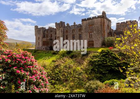 Muncaster Castle, a Medieval castle, home of the Frost Pennington family, viewed from the gardens, Ravenglass, Cumbria, Lake District, England, UK. Stock Photo