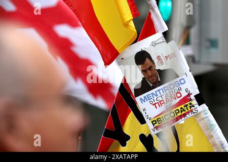 Madrid, Kingdom of Spain; 06/08/2024.- A hundred people pray the Catholic Rosary on Ferraz Street in Madrid, where the headquarters of the Spanish Socialist Workers Party (PSOE) is located. The Superior Court of Justice of Madrid (TSJM) authorized a rally to pray the rosary in front of the PSOE headquarters on Ferraz Street in the capital during the day of reflection and on Sunday itself, when the European elections are held. The authorization of the rosary in Ferraz on the day of reflection: a ruling that corrects the Electoral Board with a speaker who was a senior official of the PP. The s Stock Photo