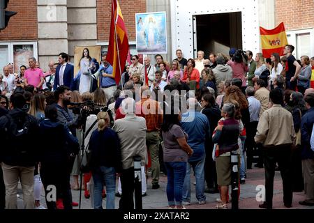 Madrid, Kingdom of Spain; 06/08/2024.- A hundred people pray the Catholic Rosary on Ferraz Street in Madrid, where the headquarters of the Spanish Socialist Workers Party (PSOE) is located. The Superior Court of Justice of Madrid (TSJM) authorized a rally to pray the rosary in front of the PSOE headquarters on Ferraz Street in the capital during the day of reflection and on Sunday itself, when the European elections are held. The authorization of the rosary in Ferraz on the day of reflection: a ruling that corrects the Electoral Board with a speaker who was a senior official of the PP. The s Stock Photo