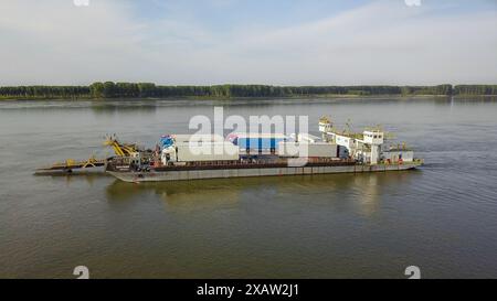 Oryahovo, Danube River, Bulgaria. June 08,2024: Ferry Bechet-Oryahovo is part of the eight road border crossings between Romania & Bulgaria. The two Southeast Europe countries partially joined the open-borders Schengen area on March 31 & controls have been lifted at air & maritime borders, but not yet on land (including inland waterways ports) following agreement with Austria & voted by EU Council. The management of controls at the Schengen external borders & the migration crisis were at the heart of debates for the elections ending in the European Union. Credit: Kevin Izorce/Alamy Live News Stock Photo