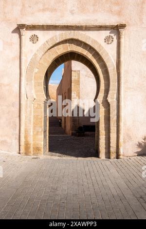 closeup of a Typical door with Arabic pointed arch on the walls of the Kasbah of the Oudayas in Rabat, Morocco. The city is a UNESCO World Heritage Si Stock Photo