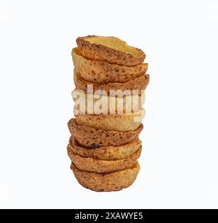 Unfilled tartlet shells isolated on a white background. Stacked group of empty mini tart cups for portable desserts Stock Photo