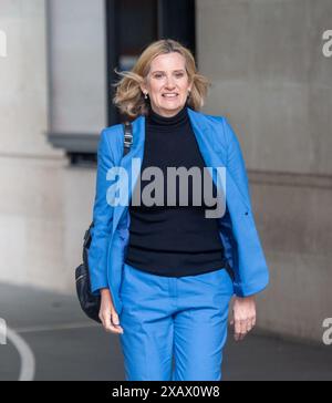 Liz Rudd EDITORIAL USE ONLY Home Secretary Amber Rudd with Liz Gilmore director ...