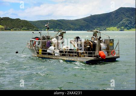 Te Hiku Ward, New Zealand - 7th November 2022:Fishing boat at anchoe in the winds Stock Photo