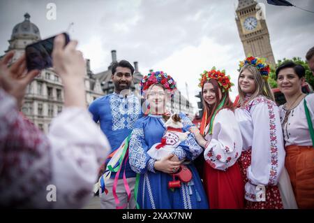 London, UK. 9th June 2024. Annual Ukrainian Vyshyvanka March. British-Ukrainians gather in Parliament Square before marching through the city wearing traditional embroidered dress, also called Vyshyvanka, which demonstrates adherence to the idea of national identity, unity and proud patriotism. Credit: Guy Corbishley/Alamy Live News Stock Photo