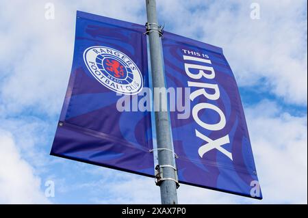 Glasgow, UK, June 9th 2024, Rangers football club flag banner against sky Stock Photo