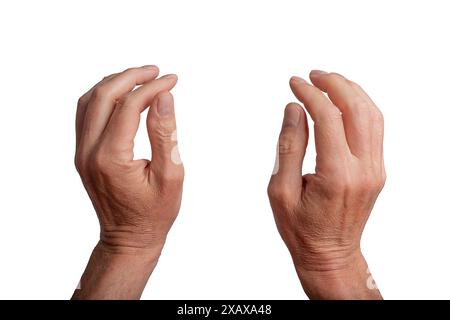 Two hands grasping, isolated on white background. Gesture indicating grabbing or catching something invisible, interaction and communication concepts. Stock Photo