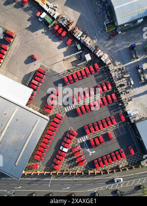 Aerial view from drone of Royal Mail delivey vehicles and vans parked at a mail delivery office in Hereford UK - photo June 2024 Stock Photo