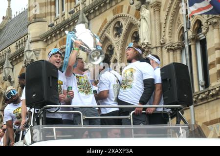 Northampton Saints Rugby team winners celebrating the premiership win in town centre  crowds of people cup winners win Town hall outside on a bus tour Stock Photo