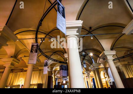 Nobel Prize Museum on the Stortorget in Gamla Stan. Profiles of all the Nobel Prize winners since 1901 hang from a rail and float through the exhibition rooms. Stockholm, Sweden Stock Photo