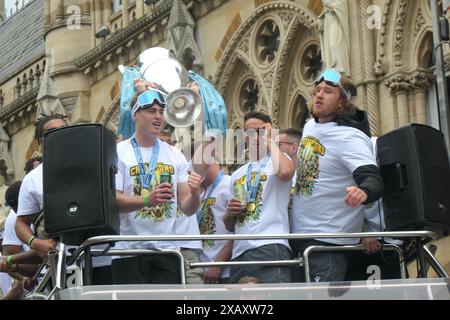 Northampton Saints Rugby team winners celebrating the premiership win in town centre  crowds of people cup winners win Town hall outside on a bus tour Stock Photo