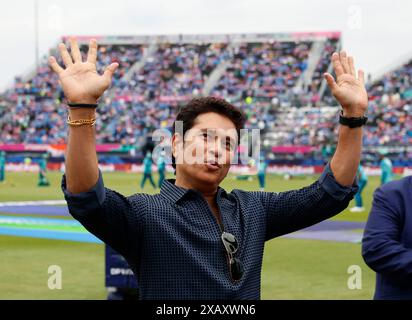 Eisenhower Park, United States. 09th June, 2024. Indian former Cricket player Sachin Tendulkar waves to fans from the field before the India vs. Pakistan match in Group A at the ICC Men's T20 World Cup 2024 at Nassau County International Cricket Stadium at Eisenhower Park on Sunday, June 9, 2024 in New York. The ICC Men's T20 World Cup 2024 winners will receive the highest amount in the tournament's history. Photo by John Angelillo/UPI Credit: UPI/Alamy Live News Stock Photo