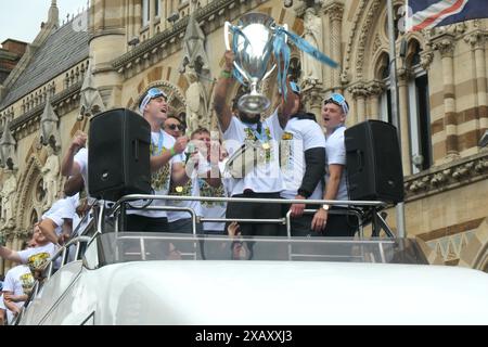 Northampton Saints Rugby team winners celebrating the premiership win in town centre  crowds of people cup winners win Town hall outside on a bus tour Stock Photo