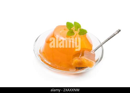 Orange  peach jelly with fruit slices isolated on white Stock Photo