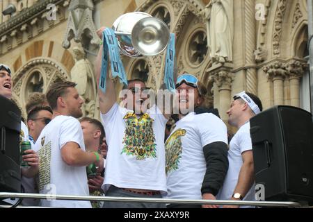 Northampton Saints Rugby team winners celebrating the premiership win in town centre  crowds of people cup winners win Town hall outside on a bus tour Stock Photo