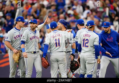 New York Mets' catcher Luis Torrens (centre, rear) is congratulated by his team mates after making a double play to finish the match during game two of the MLB London Series at the London Stadium, London. Picture date: Sunday June 9, 2024. Stock Photo