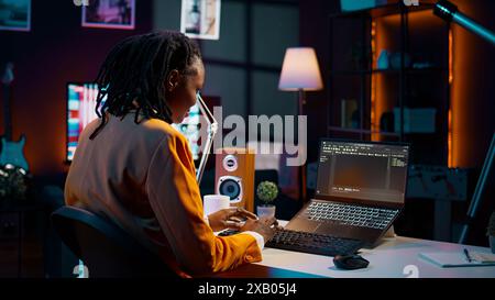 Database engineer student writing code for improving network or debugging server, using html script on terminal window. Girl learning programming language and infographics. Camera B. Stock Photo