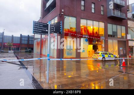 Bury, UK. 10 JUN, 2024. Direct action group target Bury branch of Barclays bank on Central Street. The direct action group have targeted other branches in recent weeks and on this occasion smashed windows and sprayed the building with red paint as well as caused damage to ATM machines. Credit Milo Chandler/Alamy Live News Stock Photo