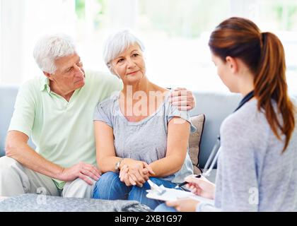 Senior, couple and consultation with therapist for advice in counseling for mental health and support. Psychologist, help and mature people in Stock Photo